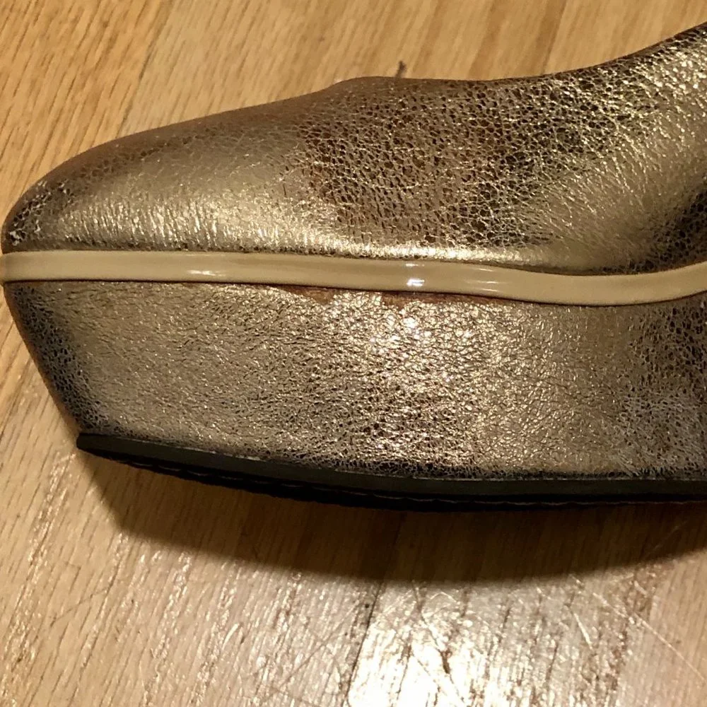 Anthropologie gold gilt